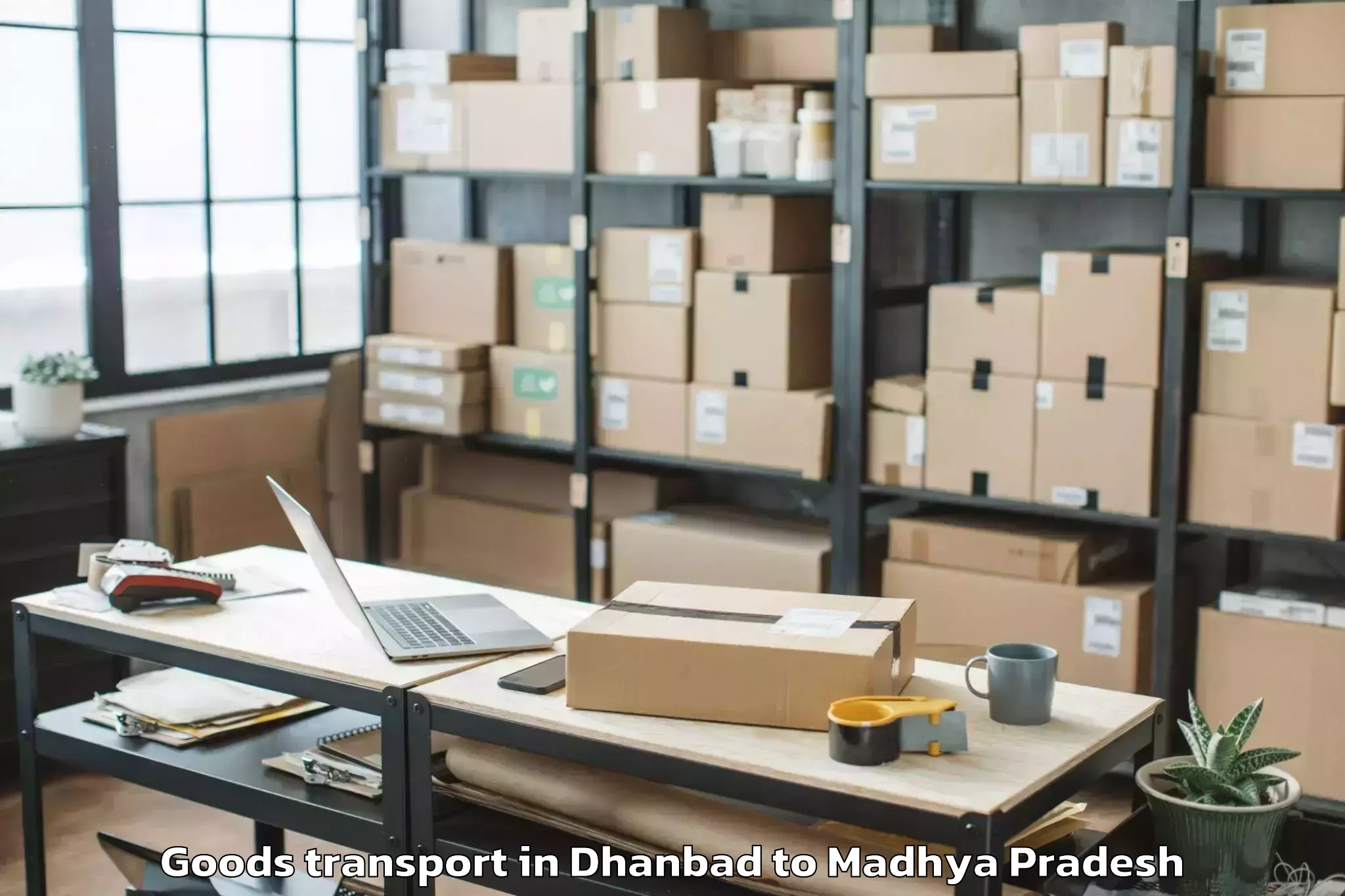 Book Dhanbad to Madwas Goods Transport